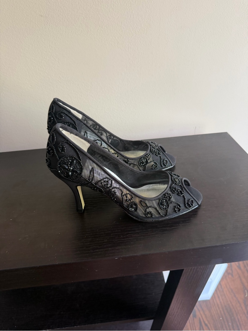 Caprarros Black Mesh and Beaded Peep-Toe Heels with an intricate flower pattern.